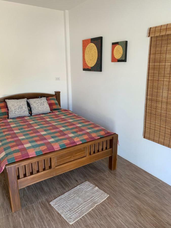Sunray Guesthouse สุนันท์บ้านพักริมคลอง Утхайтхані Екстер'єр фото