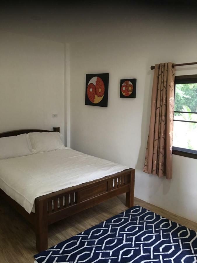 Sunray Guesthouse สุนันท์บ้านพักริมคลอง Утхайтхані Екстер'єр фото